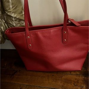 Bright red coach bag. Hardly used. Leather front
